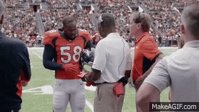 Football Player 58 Talking To Coach GIF