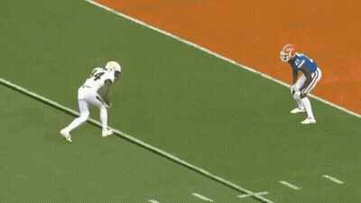 Football Player 77 Tackled By Player 92 GIF