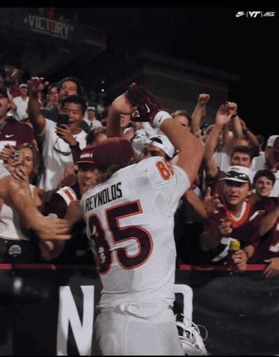 Football Player 85 Surrounded By Fans GIF