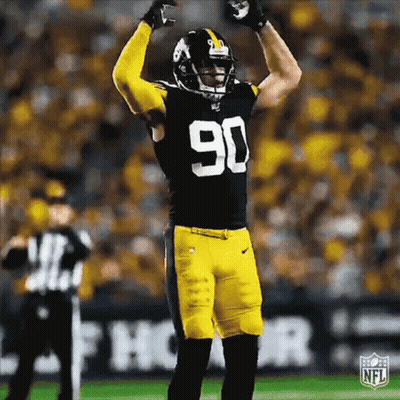 Football Player Arms Up With Referee GIF