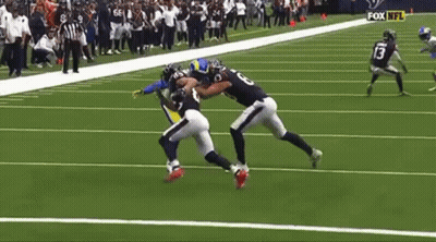 Football Player Being Tackled GIF