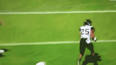 Football Player Being Tackled GIF