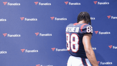 Football Player By Blue Fanatics Wall GIF