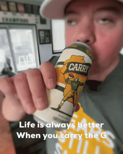Football Player Catching Ball On Field GIF