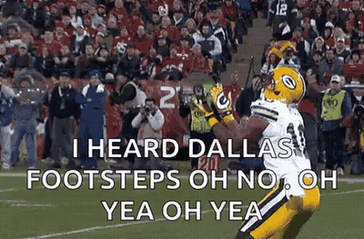 Football Player Catching Ball On Field With Crowd GIF