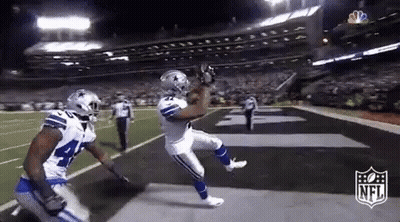 Football Player Catching Ball Teammate Watching GIF