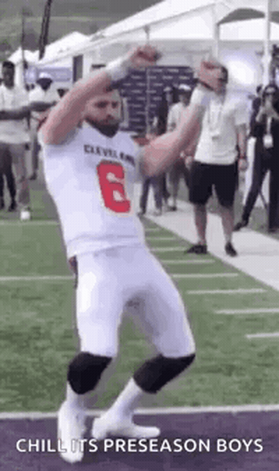 Football Player Dancing With Hands Up GIF
