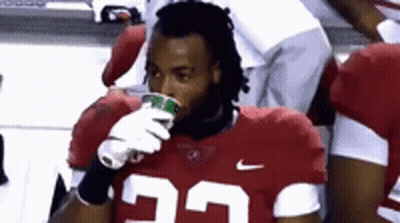 Football Player Drinking From Cup In Red Jersey 25 GIF