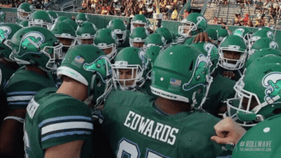 Football Player Edwards Surrounded By Players GIF