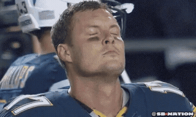 Football Player Eyes Closed Blue Jersey Number 7 GIF