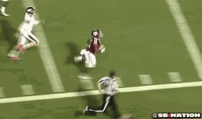 Football Player Handstand Referee Watches GIF