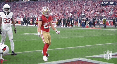 Football Player Helmet Adjusted By Person GIF