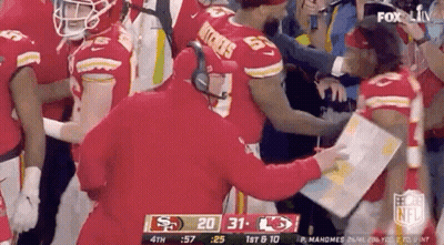 Football Player Helped Off Field By Coach GIF
