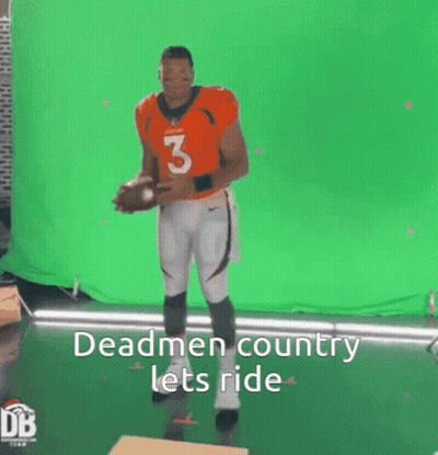 Football Player Holding Ball GIF