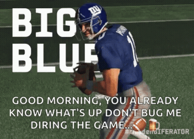 Football Player Holding Ball Saying Big Blue GIF