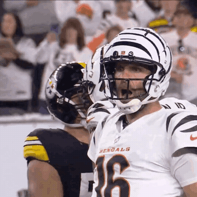 Football Player Holding Helmet Saying There He Is GIF