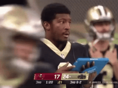 Football Player Holding Tablet Watching Game GIF