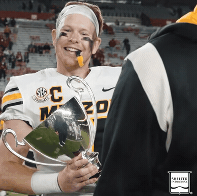 Football Player Holding Trophy With SEC GIF