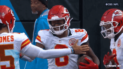 Football Player Hugging Number 5 Jersey GIF