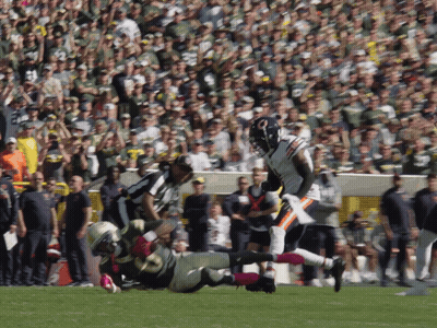 Football Player in Bears Jersey Running