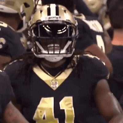 Football Player In Black And Gold Uniform Number 41 GIF