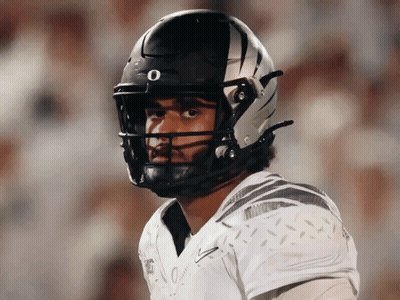 Football Player In Black And White Helmet With Letter O GIF