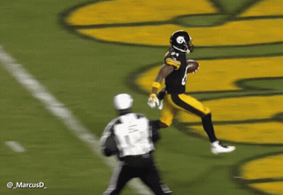 Football Player In Black And Yellow Uniform Number 12 GIF