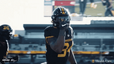 Football Player In Black And Yellow Uniform Number 3 GIF