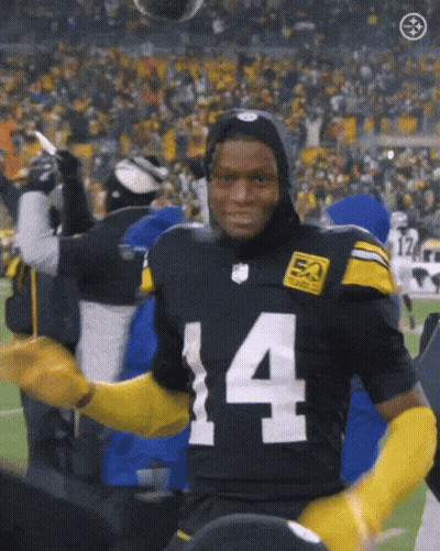 Football Player In Black And Yellow Uniform Number 4 GIF