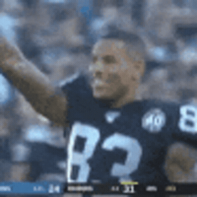 Football Player In Black Jersey 83 Waving Hand GIF