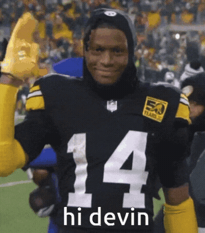 Football Player In Black Jersey Number 14 Giving High Five GIF