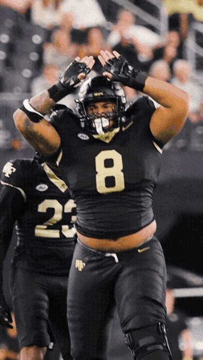 Football Player In Black Jersey Number 8 GIF