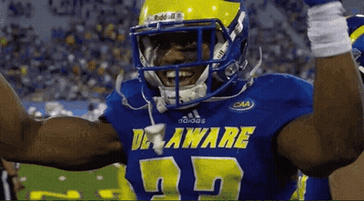 Football Player In Blue And Yellow Jersey Number 35 GIF