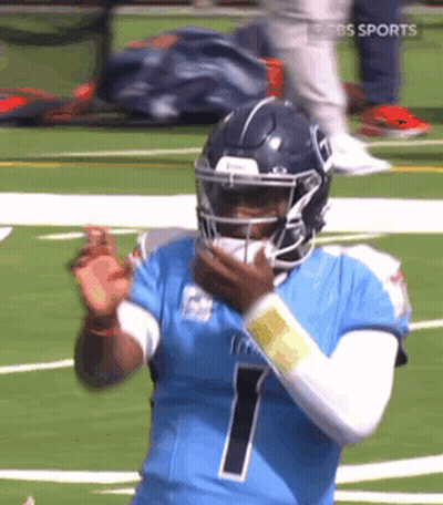 Football Player In Blue Jersey And Helmet GIF