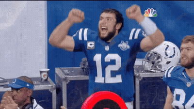 Football Player In Blue Jersey Number 12 GIF