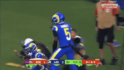 Football Player In Blue Jersey Number 15 GIF