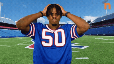 Football Player In Blue Jersey Number 50 GIF