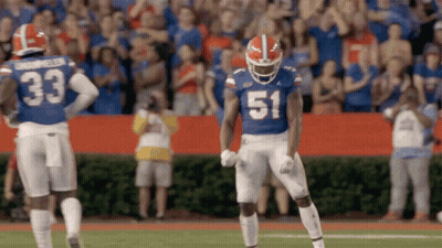 Football Player In Blue Jersey Number 51 GIF