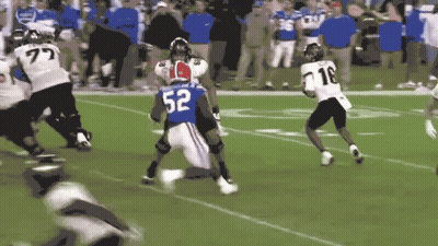 Football Player In Blue Jersey Number 52 GIF