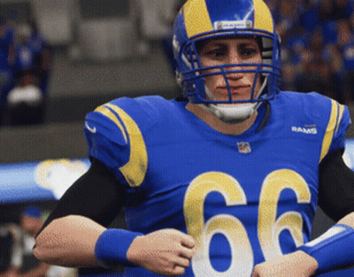 Football Player In Blue Jersey Number 66 GIF