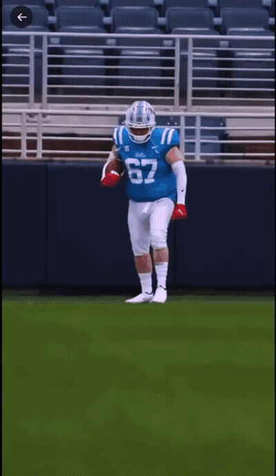 Football Player In Blue Jersey Number 67 GIF