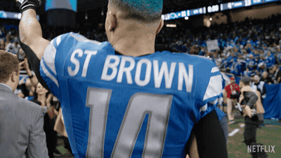 Football Player In Blue Jersey St Brown GIF