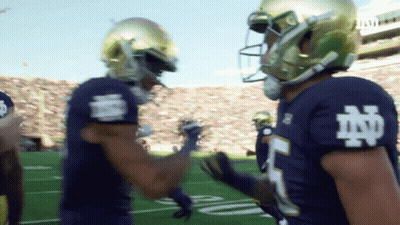 Football Player In Blue Jersey With Letter N GIF