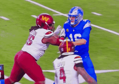 Football Player In Blue Uniform Number 12 GIF