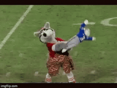 Football Player In Blue Uniform Number 12 Laying Down GIF