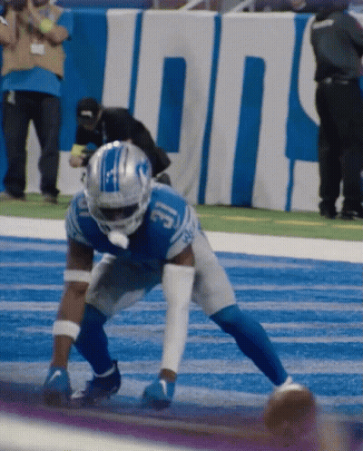 Football Player In Blue Uniform Number 13 Helmet GIF