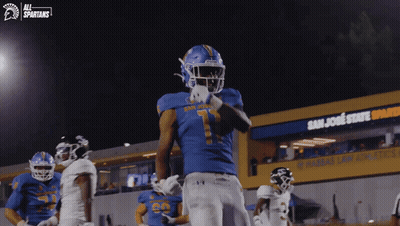 Football Player In Blue Uniform Number 7 GIF