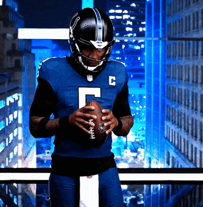 Football Player In Blue Uniform With Letter C GIF
