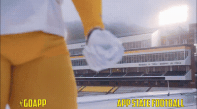 Football Player In Front Of App State Football Stadium GIF