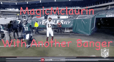 Football Player In Front Of Magic Mclaurin Banner GIF